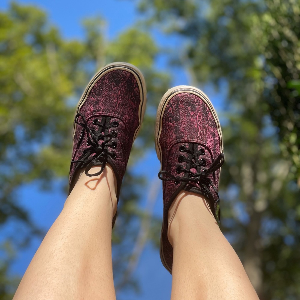 Black and pink Vans